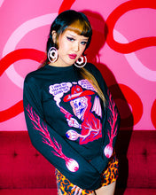 Load image into Gallery viewer, Model posing in tee. Black background with a bust of a skull in a red cloak and cowboy hat. The skull has 4 sweat drops on it's forehead and 2 gold teeth and is holding a red smoking gun in it's right hand. There is a large eye ball with veins connected to it at the bottom. The top reads I Have No Idea What's Going On and Have No Interest in Ever Finding Out.