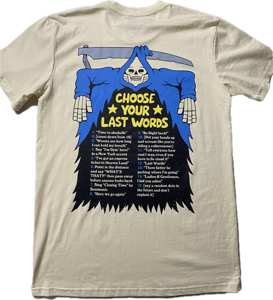 An off white short sleeve t-shirt with a cartoon skeleton in a blue cloak and sickle above it's head.  in the body of the skeleton it reads Choose Your Last Words in puffy gold font.  Below that title are various options to choose from.