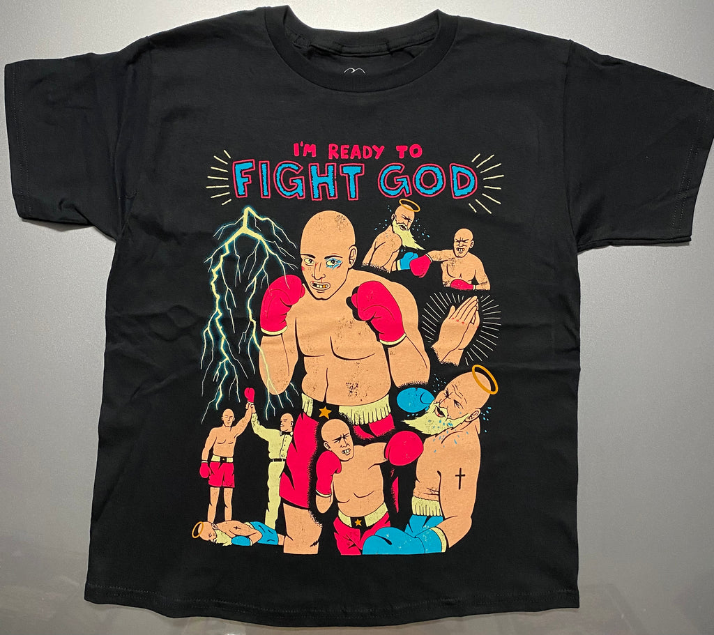 A black short sleeve t-shirt with 7 cartoon boxing figures printed on the front.  One opponent is in red gloves and trunks and the other is in blue gloves and trunks.  The blue trunks guy has a halo over his head and he has a long blond beard.  Above the graphic it reads I'm Ready to Fight God.