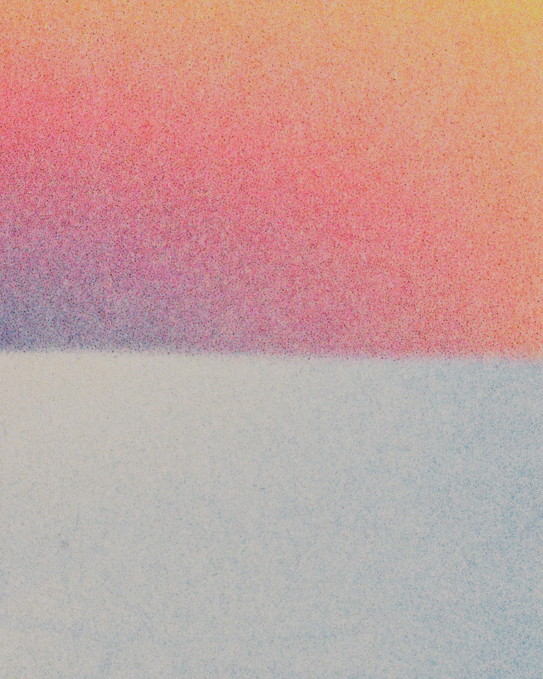 Closeup of the risograph print. The focus is on the intersection of the ocean and the sky, where a very light blue color of the ocean meets the blue, purple, red, and yellow gradient of the sunset. There is a grainy effect across everything.