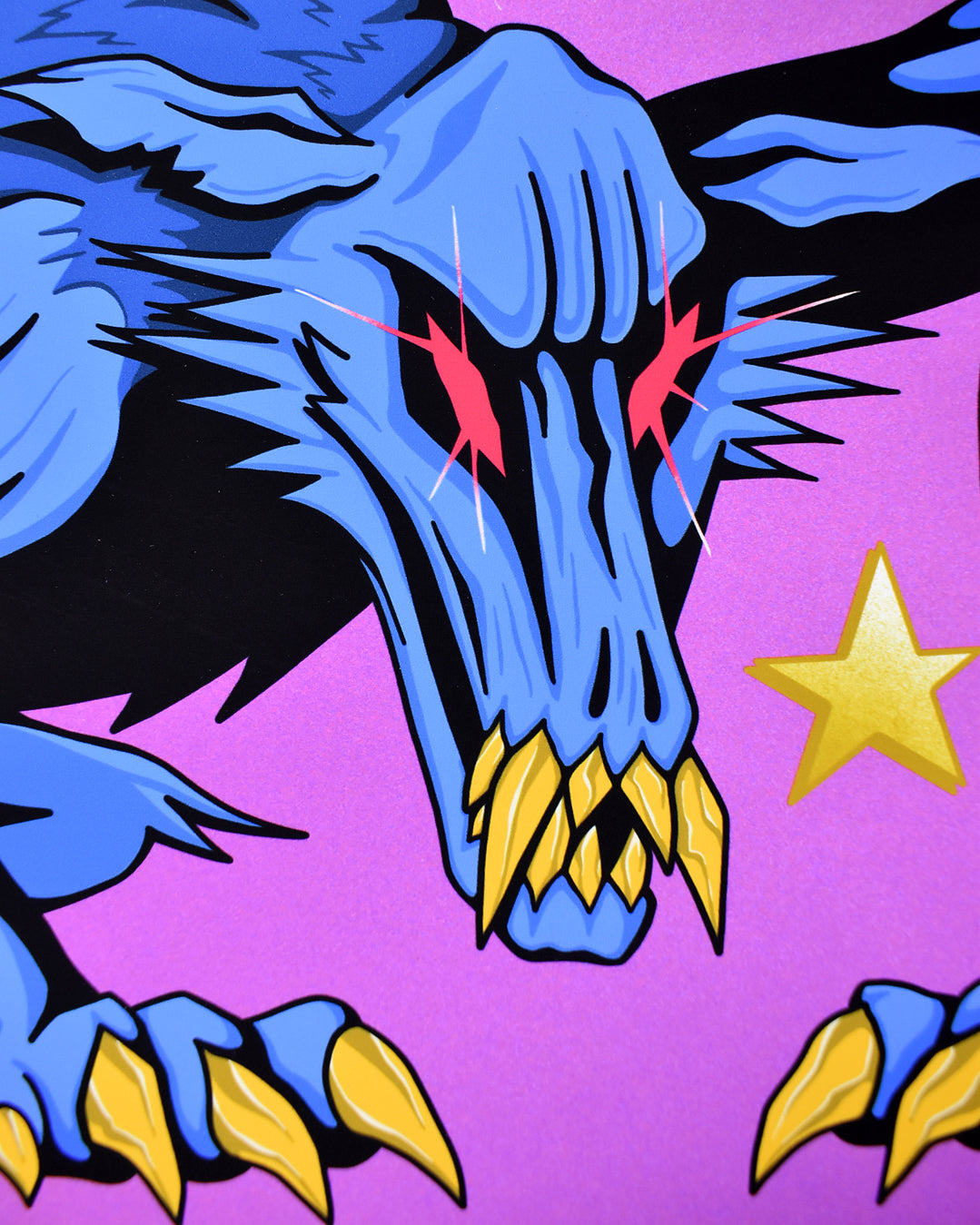 A close up of the giclee print of a blue creature with gold fangs and claws with red eyes. The creature is down on all four legs like a human dog. The background is purple. 3 gold stars are also in the background. Original art of the Ravenous Chupacabra creature from Hasbro's Magic the Gathering.